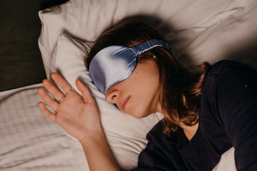 Blue fabric eye mask shown during rest